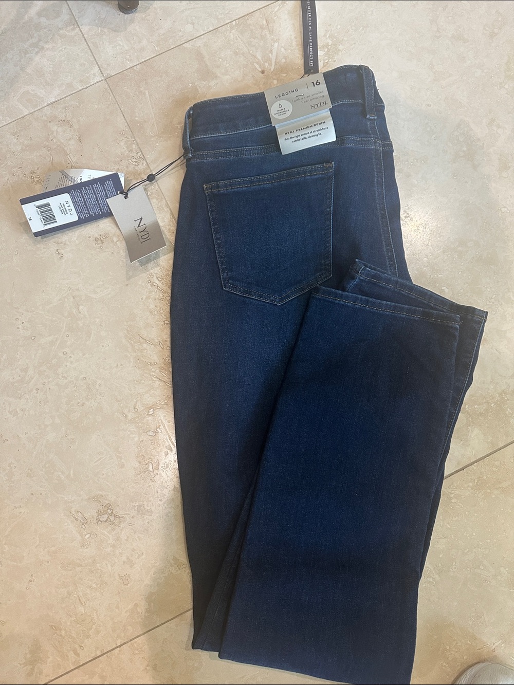 NYDJ Deep Indigo Slim Straight Jeans.